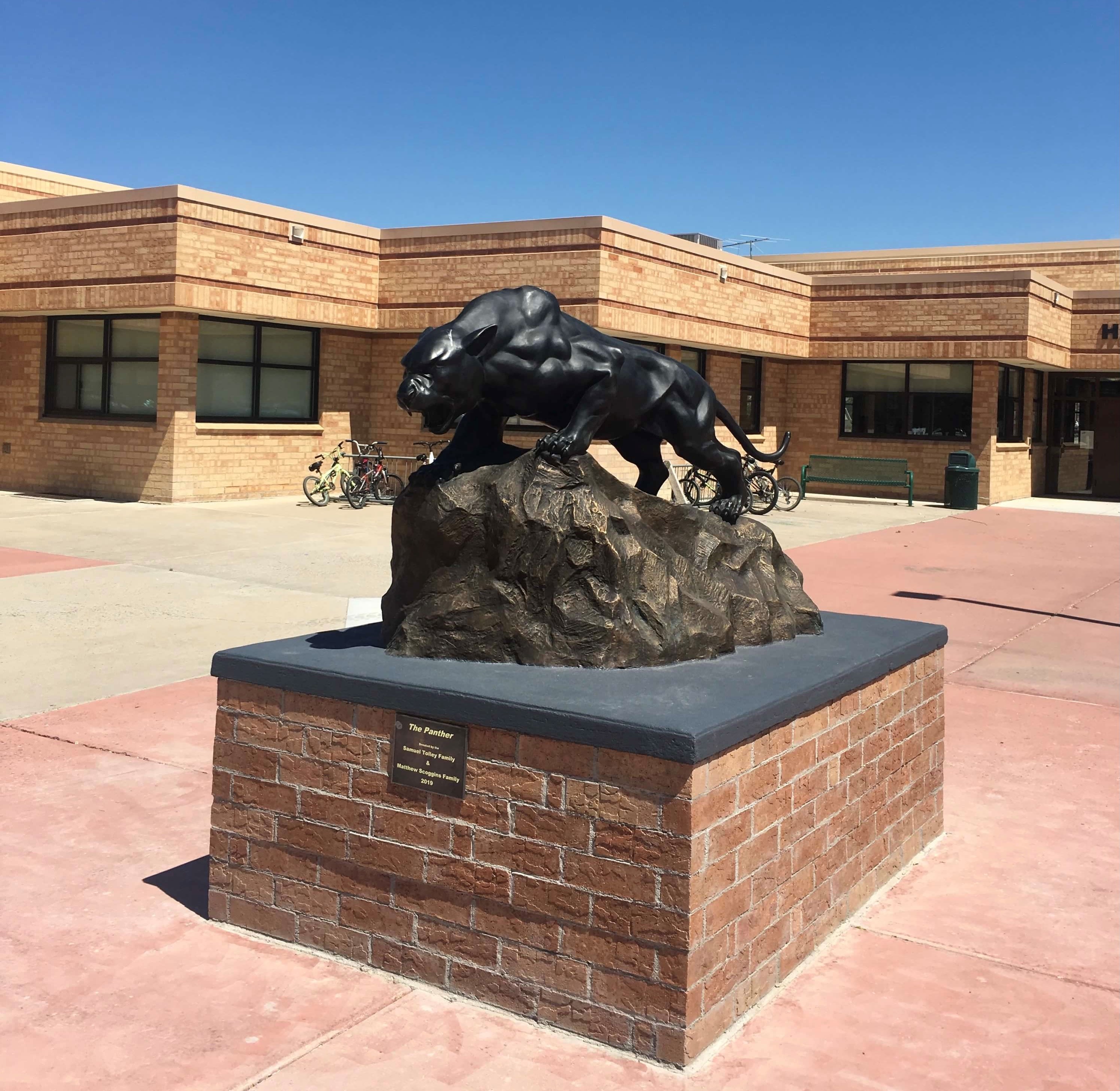 Rangely High School with Panther Mascot Statue in front