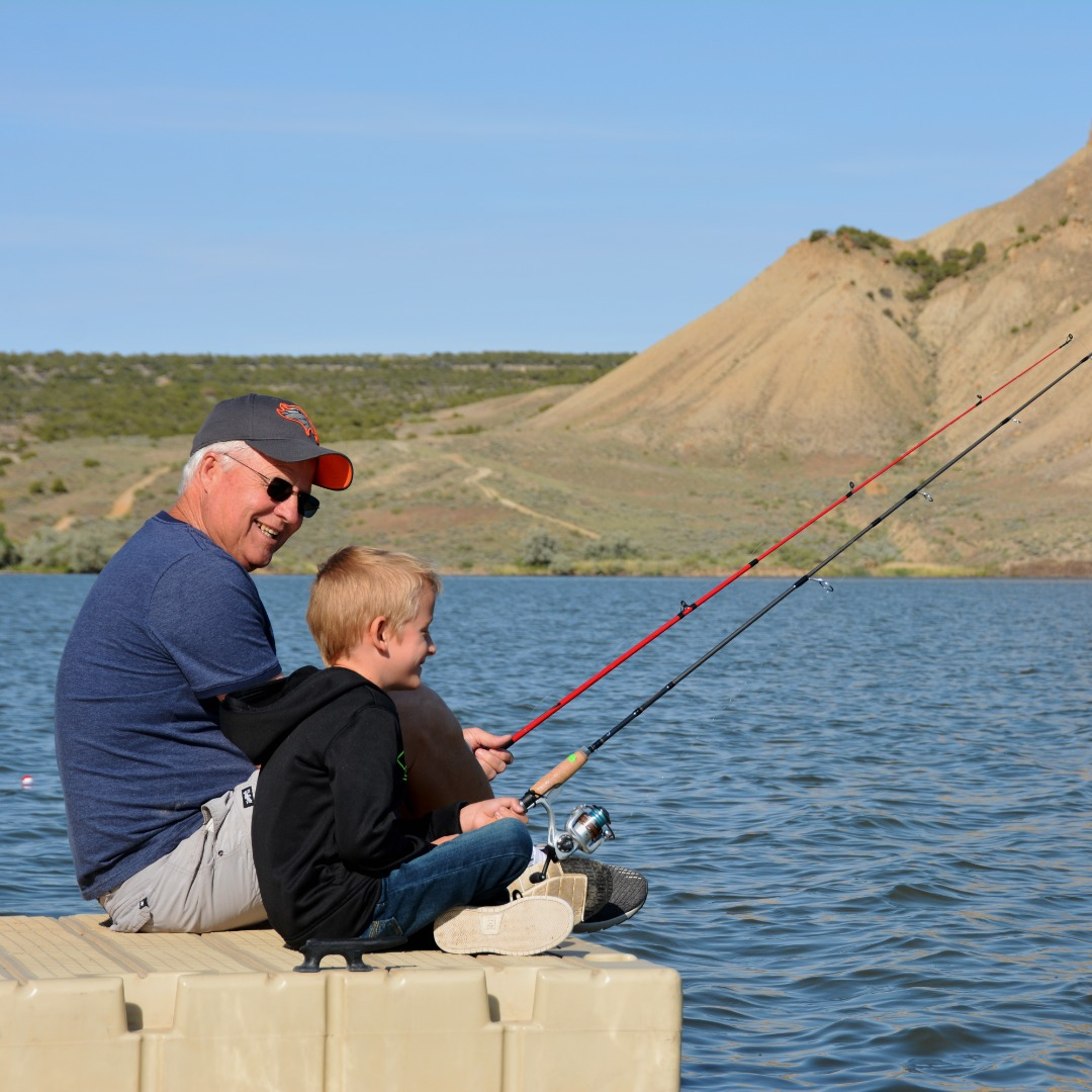 Grandpa and Grandson fishing at Kenney Reservoir